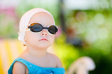 Image showing Little girl in swimming glasses