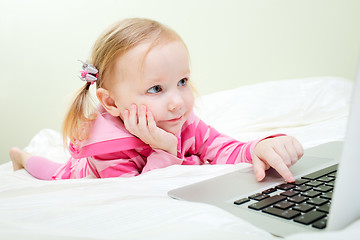 Image showing Little girl with laptop