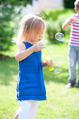 Image showing Blowing soap bubbles