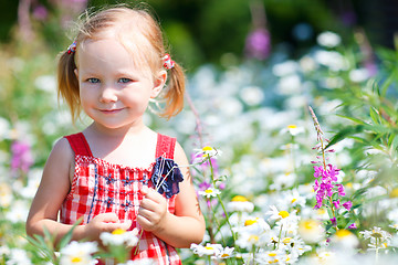 Image showing Little girl in meadow