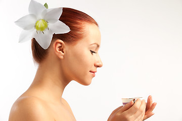 Image showing naked girl with flower in hairs