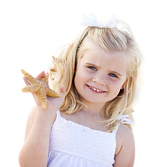 Image showing Adorable Little Blonde Girl with Starfish Isolated