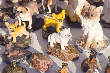 Image showing Clay handmade ceramic dog cat figurines sell fair 