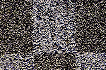 Image showing Background macro closeup of  asphalt road marks 