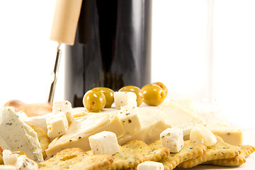 Image showing Feta cheese and red wine and crackers