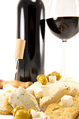 Image showing Red wine with crackers and cheese