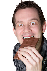Image showing man eating chocolaet