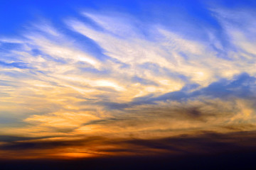 Image showing Red clouds in a blue sky