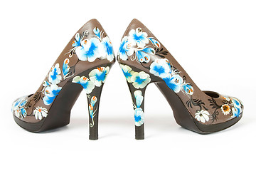 Image showing high heels shoes with printed flower