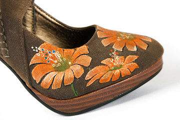 Image showing high heels shoes with printed flower