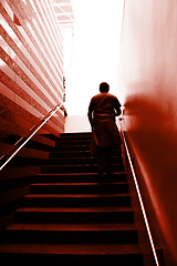 Image showing Man climbing on the stairs