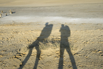 Image showing Shadows of two travellers