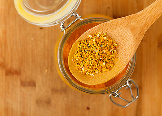 Image showing spice saffron and pepper in a wooden spoon