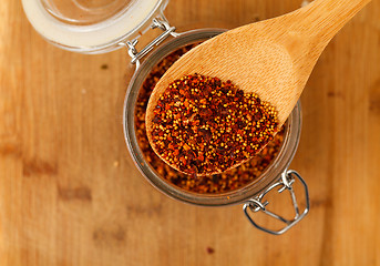 Image showing mixture spice in a wooden spoon