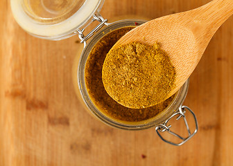 Image showing mixture spice in a wooden spoon