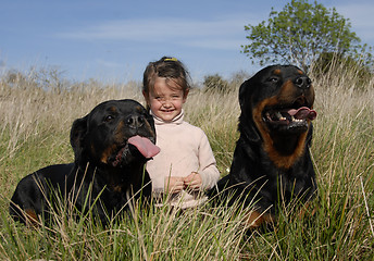 Image showing dangerous dogs and child