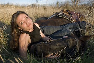 Image showing woman and horse in field