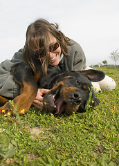 Image showing smiling girl and dog