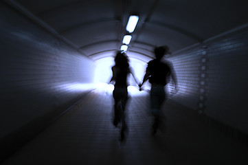 Image showing Two people in a tunnel
