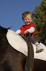 Image showing riding little boy