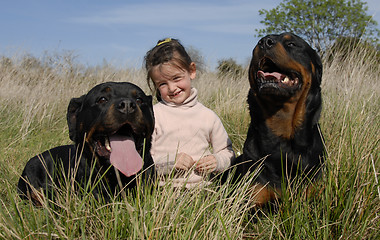 Image showing dangerous dogs and child