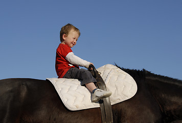 Image showing riding little boy