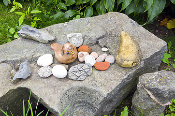 Image showing Ancient retro rock stone garden figure bird 