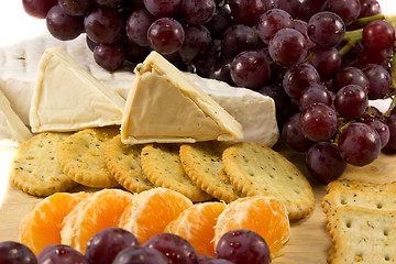 Image showing Closeup of grapes cheese and crackers