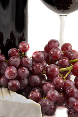 Image showing Red wine and closeup on grapes