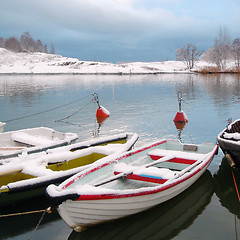 Image showing Boats under snow