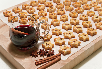 Image showing Freshly baked cheese cookies and hot wine