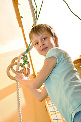 Image showing cportive child playing at gym