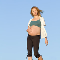 Image showing pregnant woman on meadow