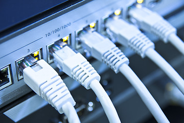 Image showing network cables connected to switch