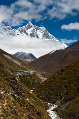 Image showing Summits Lhotse and Lhotse shar. Village and stream