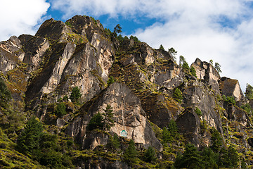 Image showing Himalaya Landscape: rocks, trees and Buddhist symbols