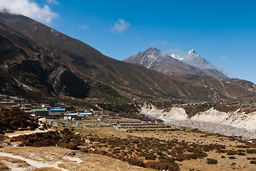 Image showing Himalayas in Nepal: highland village and peaks