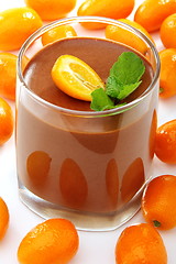 Image showing Chocolate mousse with kumquat.