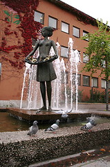 Image showing The girl with the roses in Molde