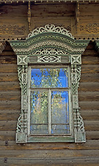 Image showing Old wooden window with carved decoration