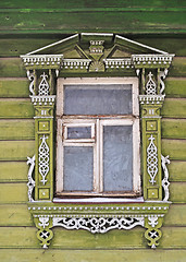 Image showing Old wooden window, decorated with carving