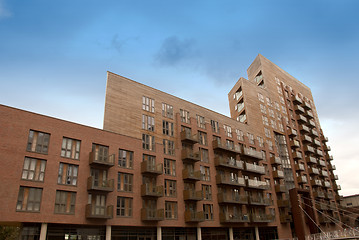 Image showing Large Red Apartment Block