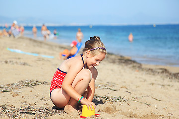 Image showing Child playing on the beach