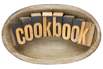 Image showing cookbook in wooden bowl