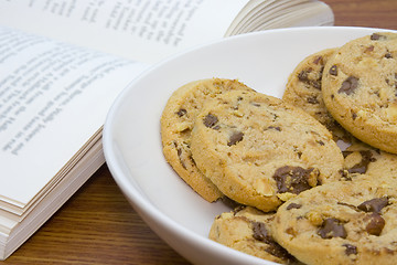 Image showing Bowl of cookies and book