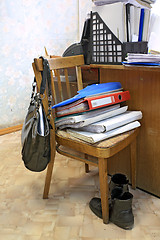 Image showing files on chair in office