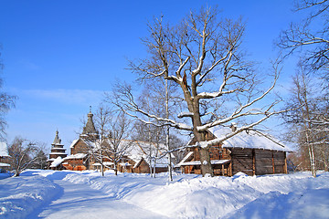 Image showing wooden chapel in winter village