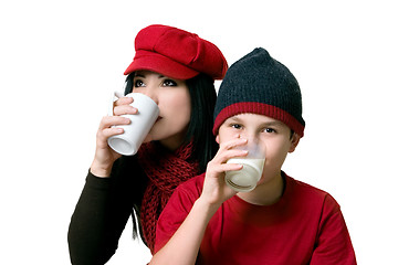 Image showing Two people drinking beverages