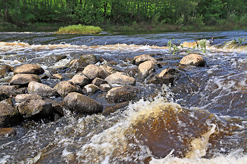 Image showing greater stone on mountain river 