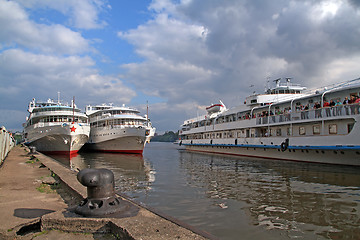 Image showing three motor ships on quay